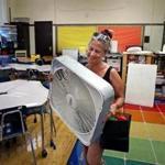 BOSTON, MA - 9/04/2018: HOT CLASSROOM....Getting ready for school opening on Thursday, Meg Goodwin, a fourth grade teacher brought her own fan to her classroom that is needed to help with Boston's humid temperatures at the Thomas Edison School in Allston. The school has no air conditioning. (David L Ryan/Globe Staff ) SECTION: METRO TOPIC stand alone photo