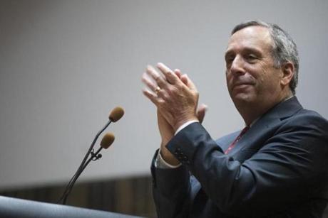 Harvard President Larry Bacow claps for students' achievements on Thursday, Sept. 13, 2018 at International Technology Academy (ITA) in Pontiac, Mich. Harvard President Larry Bacow visited his Hometown High School to discuss pathways to higher education. (Rachel Woolf for the Boston Globe)
