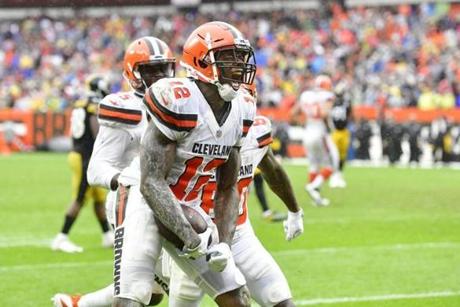 Cleveland Browns receiver Josh Gordon (12) celebrates his touchdown reception during an NFL football game against the Pittsburgh Steelers, Sunday, Sept. 9, 2018, in Cleveland. The Browns and the Steelers tied at 21-21. (AP Photo/David Richard)
