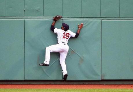BOSTON, MA - JUNE 28: Jackie Bradley Jr. #19 of the Boston Red Sox makes a catch in center field in the first inning of a game against the Los Angeles Angels at Fenway Park on June 28, 2018 in Boston, Massachusetts. (Photo by Adam Glanzman/Getty Images)
