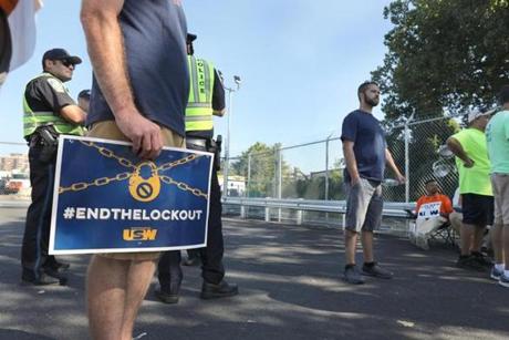 Locked-out National Grid workers picketed this month outside the National Grid gas facility yard in Malden.
