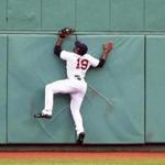 BOSTON, MA - JUNE 28: Jackie Bradley Jr. #19 of the Boston Red Sox makes a catch in center field in the first inning of a game against the Los Angeles Angels at Fenway Park on June 28, 2018 in Boston, Massachusetts. (Photo by Adam Glanzman/Getty Images)