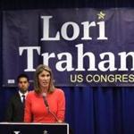 Lori Trahan sought to tie opponent Rick Green directly to President Trump.