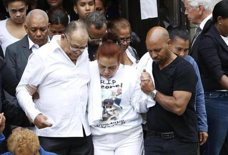 Mourners including Miguel Rondon (left), the father of Leonel Rondon, left his funeral at St. Mary Immaculate Conception Church in Lawrence. 
