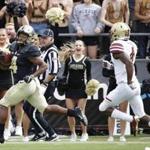 WEST LAFAYETTE, IN - SEPTEMBER 22: Rondale Moore #4 of the Purdue Boilermakers runs downfield for a 70-yard touchdown after catching a pass in the second quarter of the game against the Boston College Eagles at Ross-Ade Stadium on September 22, 2018 in West Lafayette, Indiana. (Photo by Joe Robbins/Getty Images)