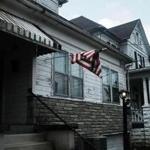CLARKSBURG, WV - AUGUST 22: An American flag hangs outside of a home in Clarksburg on August 22, 2018 in Clarksburg, West Virginia. Despite a strong economy in many parts of America, West Virginia, a state that voted overwhelmingly for Donald Trump in the 2016 election, still struggles with endemic poverty and opioid abuse. West Virginia's poverty rate stands at 17.9 percent and as of 2016 the state had the highest rate of opioid-related overdose deaths in the United States, at 43.4 deaths per 100,000 people. (Photo by Spencer Platt/Getty Images)
