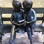 Someone stole the book off this statue of two children reading in front of the Hull Public Library.