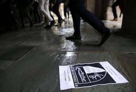 New Haven, CT--9/25/2018-- People walk past a flier from yesterday's protest against Brett Kavanaugh at Yale Law School. (Jessica Rinaldi/Globe Staff) Topic: 26yalepic Reporter:

