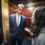 Ana Maria Archila (right) confronted Senator Jeff Flake (left) in an elevator after Flake announced that he would vote to confirm Supreme Court nominee Brett Kavanaugh in the Russell Senate Office Building Friday.