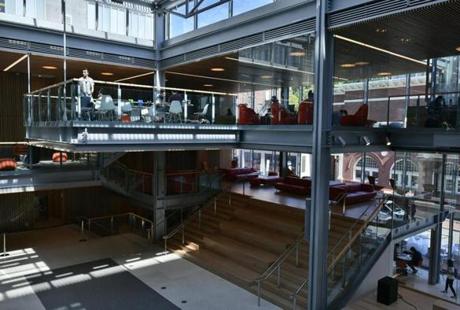 A cantilevered seating area is part of the former Holyoke Center at Harvard.
