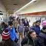 BOSTON, MA - 1/25/2018: Downtown crossing is the busy hub.... The Orange Line morning commute on the MBTA heading inbound. (David L Ryan/Globe Staff ) SECTION: METRO TOPIC 26crowding