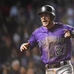 CHICAGO, IL - OCTOBER 02: Trevor Story #27 of the Colorado Rockies celebrates after scoring a run in the thirteenth inning to give the Rockies a 2-1 lead against the Chicago Cubs during the National League Wild Card Game at Wrigley Field on October 2, 2018 in Chicago, Illinois. (Photo by Stacy Revere/Getty Images)