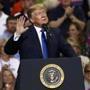 President Donald Trump gestures as he speaks about some Democrats in Congress at a rally Tuesday, Oct. 2, 2018, in Southaven, Miss. (AP Photo/Rogelio V. Solis)