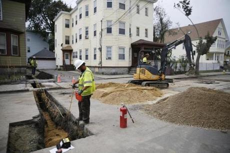 Construction continued Thursday on Brookfield Street in South Lawrence. 
