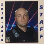 Ever since he was a kid, Brian Kelly wanted the laser background in his school picture. Now, the Pelham, N.H., police corporal finally nailed it.
