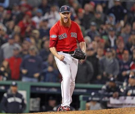 Boston MA: 10-05-18: Red Sox closer Craig Kimbrel howls after striking out he fianalbatter of the game The Boston Red Sox hosted the New York Yankees in Game One of their MLB ALDS baseball playoffs. (Jim Davis/Globe Staff) 
