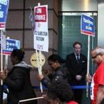 Strikers with UNITE HERE Local 26 held a picket line outside of the Ritz Carlton in Boston on Friday.