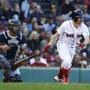 Boston, MA--9/30/2018-- Red Sox Brock Holt follows through on the swing of his RBI against the Yankees during the first inning of play at Fenway Park. () Topic: RedSox-Yankees Reporter: 