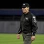 First base umpire Angel Hernandez (5) watches from his position during the second inning of Game 3 of baseball's American League Division Series between the New York Yankees and the Boston Red Sox, Monday, Oct. 8, 2018, in New York. (AP Photo/Frank Franklin II)