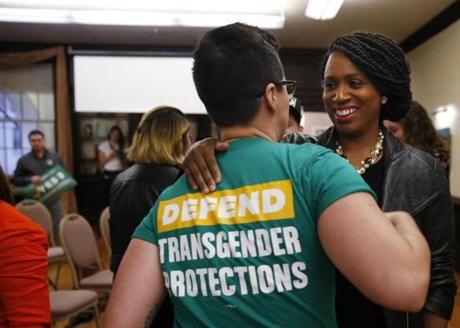 Democratic congressional nominee Ayanna Pressley embraced Bridget Schaaff, a federal policy fellow with the National LGTBQ Task Force.
