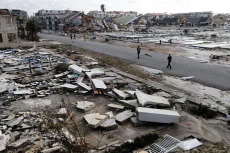 Rescue personnel searched amid the debris in the aftermath of Hurricane Michael in Mexico Beach, Fla., on Thursday.
