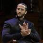Former NFL football quarterback Colin Kaepernick applauds while seated on stage during W.E.B. Du Bois Medal ceremonies, Thursday, Oct. 11, 2018, at Harvard University, in Cambridge, Mass. Kaepernick is among eight recipients of Harvard University's W.E.B. Du Bois Medals in 2018. Harvard has awarded the medal since 2000 to people whose work has contributed to African and African-American culture.(AP Photo/Steven Senne)