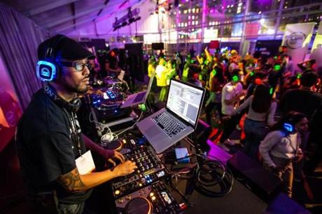 10/12/2018 BOSTON, MA DJ Savuth (cq), aka Sammy Sueksagan (cq), played music as participants listened on wireless headphones during a silent disco held at Hubweek in Boston. (Aram Boghosian for STAT)

