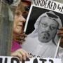 People held signs during a protest at the Embassy of Saudi Arabia in Washington about the disappearance of Saudi journalist Jamal Khashoggi. 