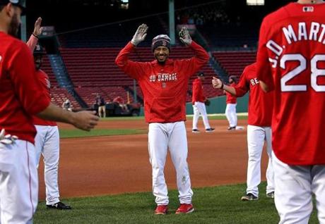 Boston, MA - 10/12/2018 - Boston Red Sox right fielder Mookie Betts (50) and the Boston Red Sox workout in preparation for Game 1 of the ALCS vs. the Houston Astros at Fenway Park. - (Barry Chin/Globe Staff), Section: Sports, Reporter: Peter Abraham, Topic: 13Red Sox, LOID: 8.4.3455684276.
