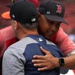 Boston, MA - 9/07/2018 - Boston Red Sox manager Alex Cora embraces Houston Astros manager AJ Hinch during the team's pre game warmups. The Boston Red Sox host the Houston Astros in Game 1 of a three game series at Fenway Park. - (Barry Chin/Globe Staff), Section: Sports, Reporter: Peter Abraham, Topic: 08Red Sox-Astros, LOID:8.4.3074412130.