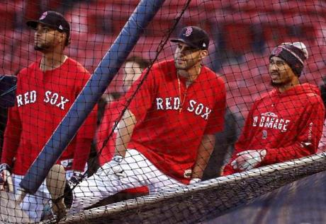 Boston, MA - 10/12/2018 - Boston Red Sox shortstop Xander Bogaerts (2), Boston Red Sox right fielder J.D. Martinez (28), Boston Red Sox right fielder Mookie Betts (50) around the batting cage at today's workout in preparation for Game 1 of the ALCS vs. the Houston Astros at Fenway Park. - (Barry Chin/Globe Staff), Section: Sports, Reporter: Peter Abraham, Topic: 13Red Sox, LOID: 8.4.3455684276.
