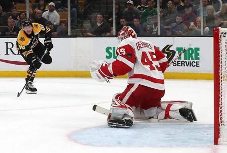 Boston MA 10/11/18 Boston Bruins right wing David Pastrnak (88) scores a goal beating Detroit Red Wings goaltender Jonathan Bernier (45) during first period action at TD Garden. (photo by Matthew J. Lee/Globe staff) topic: reporter: 
