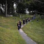 Above, Vicki Noel Harrington and Geoffrey Campbell led a tour through Plymouth?s Burial Hill Cemetery, where graves date back to the 1600s and reports of ghost sightings abound.