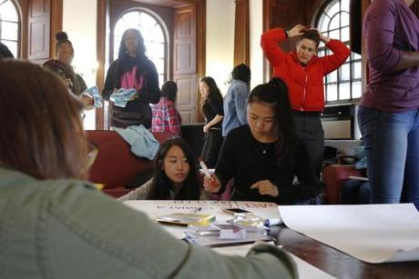 Harvard students gathered in Phillip Brooks House to make signs for a march planned for Sunday in support of affirmative action.
