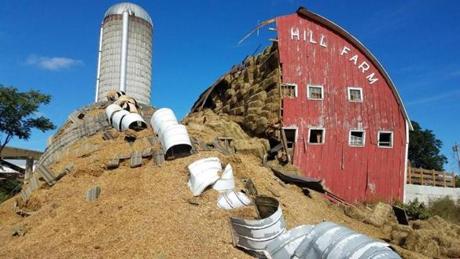 A grain silo fell onto the barn.
