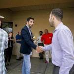 Ammar Campa-Najjar, a Democrat running for Congress in California's 50th District, greeted potential voters in Lakeside, Calif., earlier this month. A Republican group?s ad portrayed Campa-Najjar as an Islamic terrorist sympathizer because of his paternal grandfather.