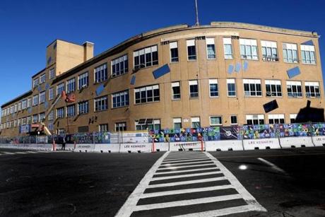 BOSTON, MA - 10/16/2018: Mayor Martin J. Walsh and others broke ground on the new Boston Arts Academy building. a $125 million project. (Demolition of the old building, across the street from Fenway Park, is apparently under way.) This ground breaking is part of a broader agenda by Walsh moving forward with a sweeping plan to overhaul the school system's aging buildings, most of which went up prior to World War II. (David L Ryan/Globe Staff ) SECTION: METRO TOPIC 17bps 
