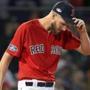 Boston, MA: 10-13-18: Red Sox pitcher Chris Sale is picture as he was giving up two runs in the top of the second inning. The Boston Red Sox hosted the Houston Astros in Game One of their ALCS baseball matchup at Fenway Park. (Jim Davis/Globe Staff) 