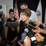 The legal action is a twist in Attorney General Maura Healey?s campaign to police the so-called competitive energy market.
