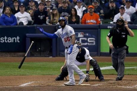 Dodgers outfielder Yasiel Puig flipped his bat after his three-run homer in the sixth inning.
