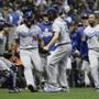 The Los Angeles Dodgers celebrate after Game 7 of the National League Championship Series baseball game against the Milwaukee Brewers Saturday, Oct. 20, 2018, in Milwaukee. The Dodgers won 5-1 to win the series. (AP Photo/Matt Slocum)
