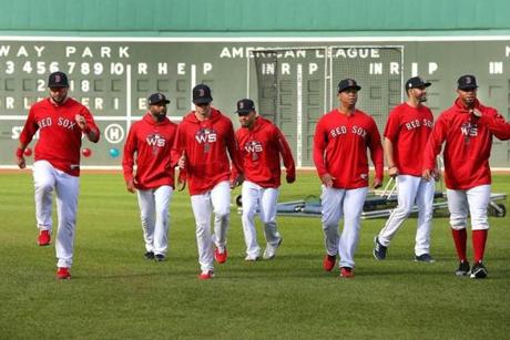 Boston10/20/18 TheRed Sox held a practice at Fenway Park as they prepare for Tuesday's start of the World Series at Fenway Park. Players do warmup runs in the outfield. Photo by John Tlumacki/Globe Staff(sports)
