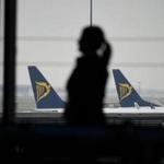 Crew members on a flight by Irish airline Ryanair are accused of ignoring a passenger?s racist rant.