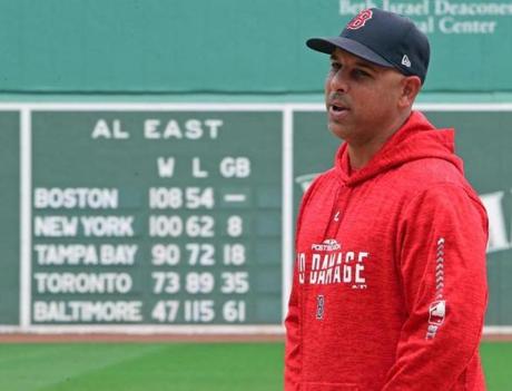 Boston, MA: 10-04-18: The scoreboard tells the story of the 108 win regular season for Red Sox rookie manager Alex Cora (pictured). The Red Sox continued to prepare for their Friday night ALDS game with a workout at Fenway Park. (Jim Davis/Globe Staff)
