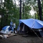 Navy veteran Norman Franks spent four months in a cramped tent in a campsite on the grounds of Hanscom Air Force Base. 