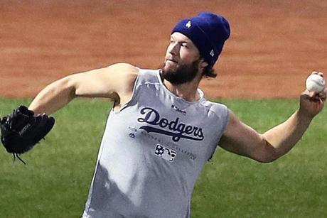 Dodgers ace Clayton Kershaw acclimated himself to Boston?s cold temperatures by going sleeveless during his workout on Monday.
