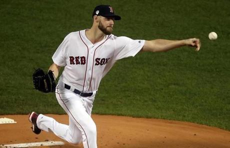 RED SOX SLIDER23 Stan Grossfeld/Globe StaffBoston, MA - 10/23/2018 - Chris Sale throws a pitch in the first inning. The Boston Red Sox host the Los Angeles Dodgers in Game 1 of the World Series at Fenway Park. (Stan Grossfeld/Globe Staff)
