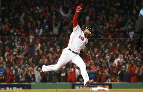 RED SOX SLIDER23 Boston, MA - 10/23/2018 - Eduardo Nunez celebrates rounding first after his 3 run home run in 7th inning. The Boston Red Sox host the Los Angeles Dodgers in Game 1 of the World Series at Fenway Park. (Jim Davis/Globe staff)
