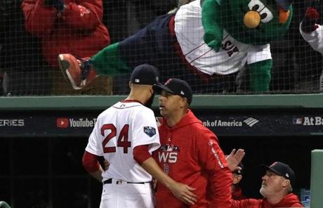RED SOX SLIDER24 24redsoxSlider28 Boston, MA - 10/24/2018 - Red Sox manager Alex Cora spoke with David Price after he pitched in the sixth inning. The Boston Red Sox host the LA Dodgers in Game 2 of the World Series at Fenway Park. (Barry Chin/Globe Staff)

