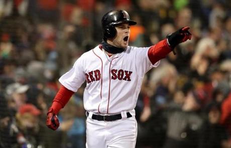 RED SOX SLIDER24 24redsoxSlider29 Boston, MA - 10/24/2018 - Andrew Benintendi Points to JD Martinez who drove him in to score in the fifth inning of Game 2 of the World Series. The Boston Red Sox host the Los Angeles Dodgers in Game 2 of the World Series at Fenway Park. (Jim Davis/Globe staff)

